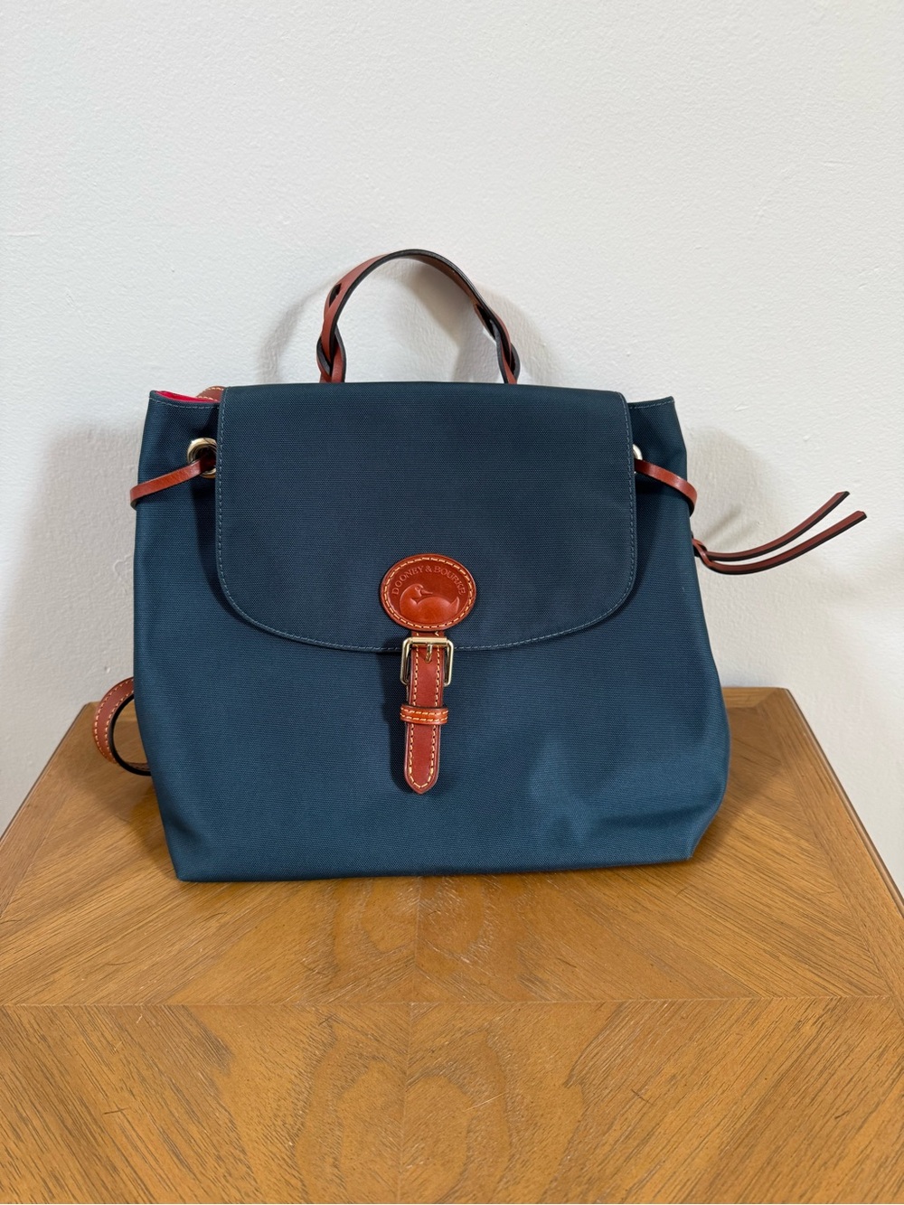 Dooney & Bourke Navy Backpack with Brown Leather Accents